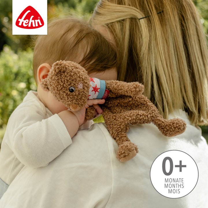 Baby kuschelt mit Baby Schmusetuch Bär