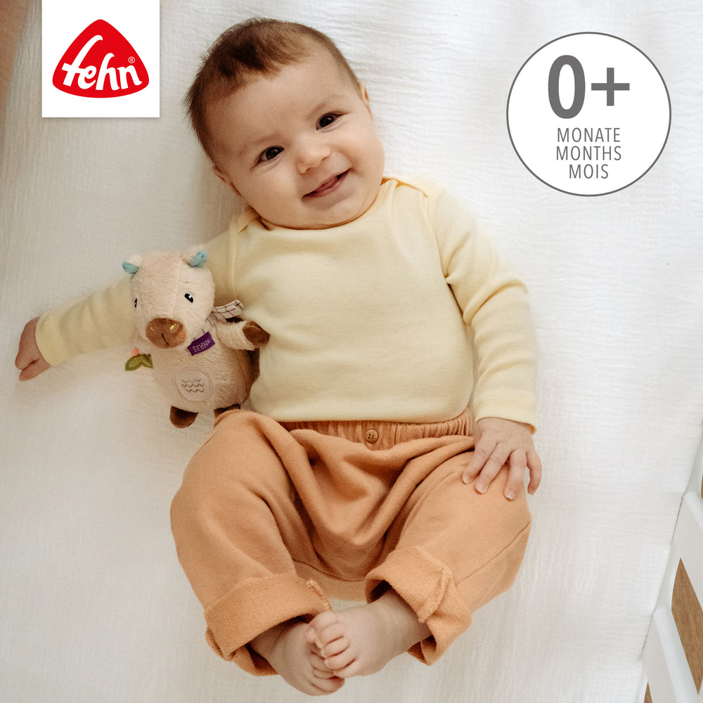 Baby liegt neben Baby Bean Bag Capybara