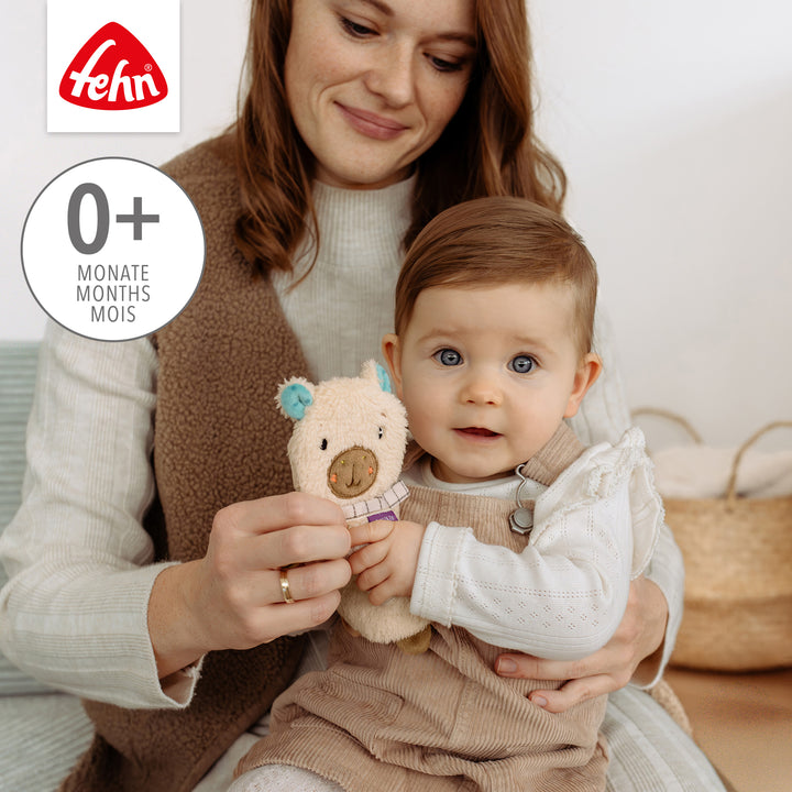 Mutter und Baby spielen mit Baby Knister-Capybara
