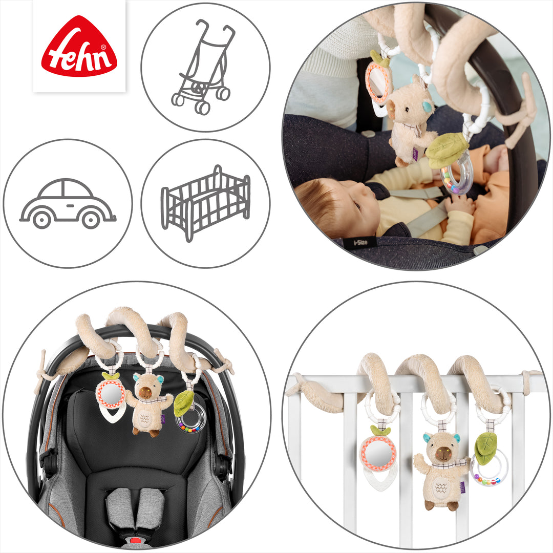Baby Activity-Spirale Capybara an Babybett und Babyschale befestigt