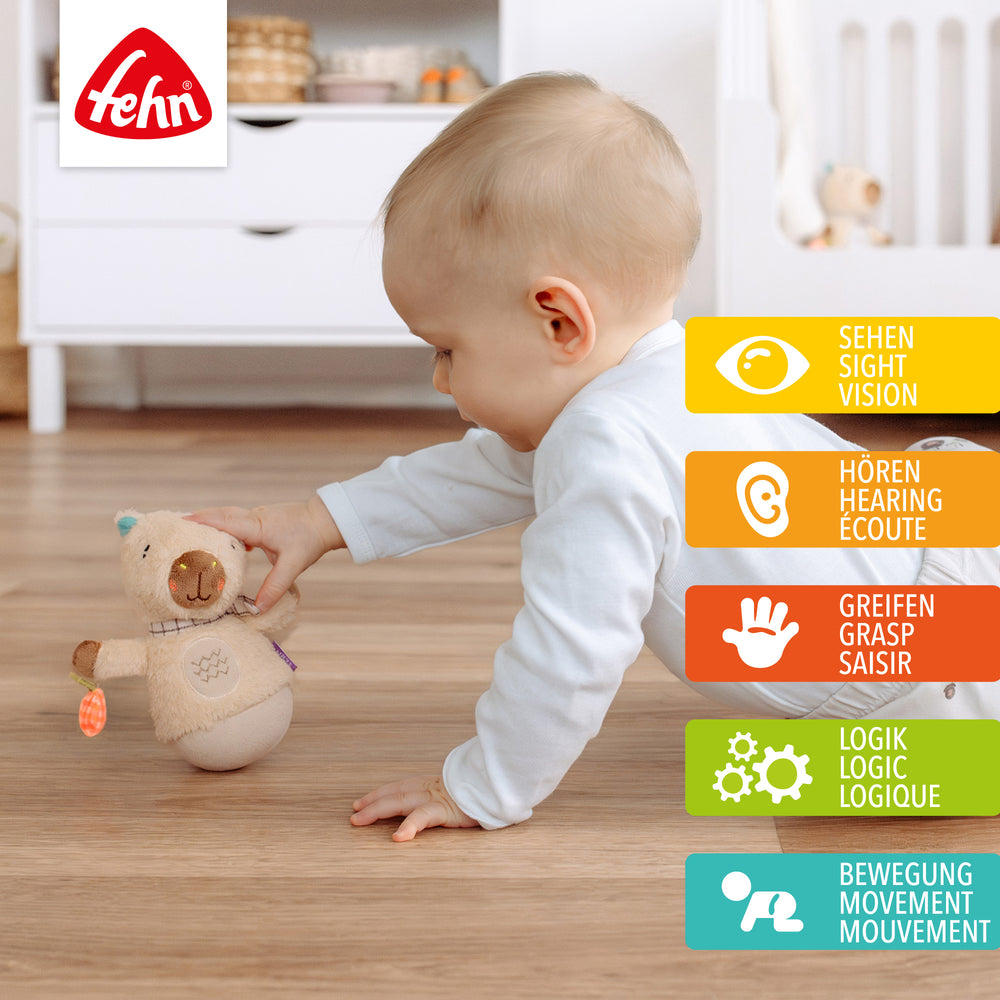 Baby stupst Baby Mini-Stehauf Capybara an