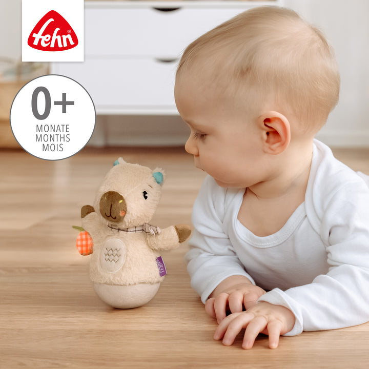 Baby beobachtet Baby Mini-Stehauf Capybara