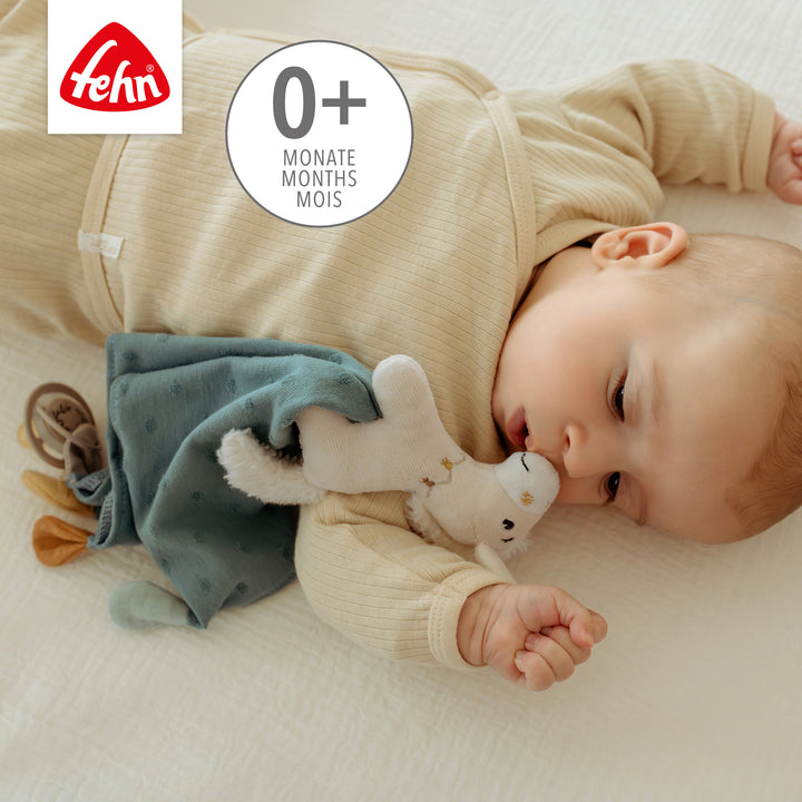 Baby kuschelt mit Baby Schmusetuch Pferd