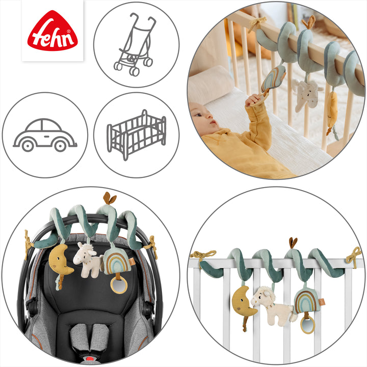 Baby Activity-Spirale Pferd an Babybett und Babyschale befestigt