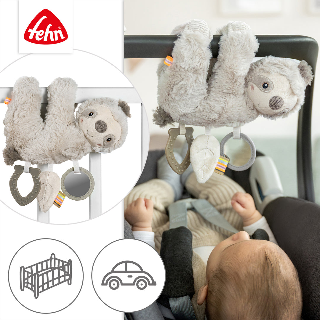 Baby Activity-Faultier an Babyschale befestigt