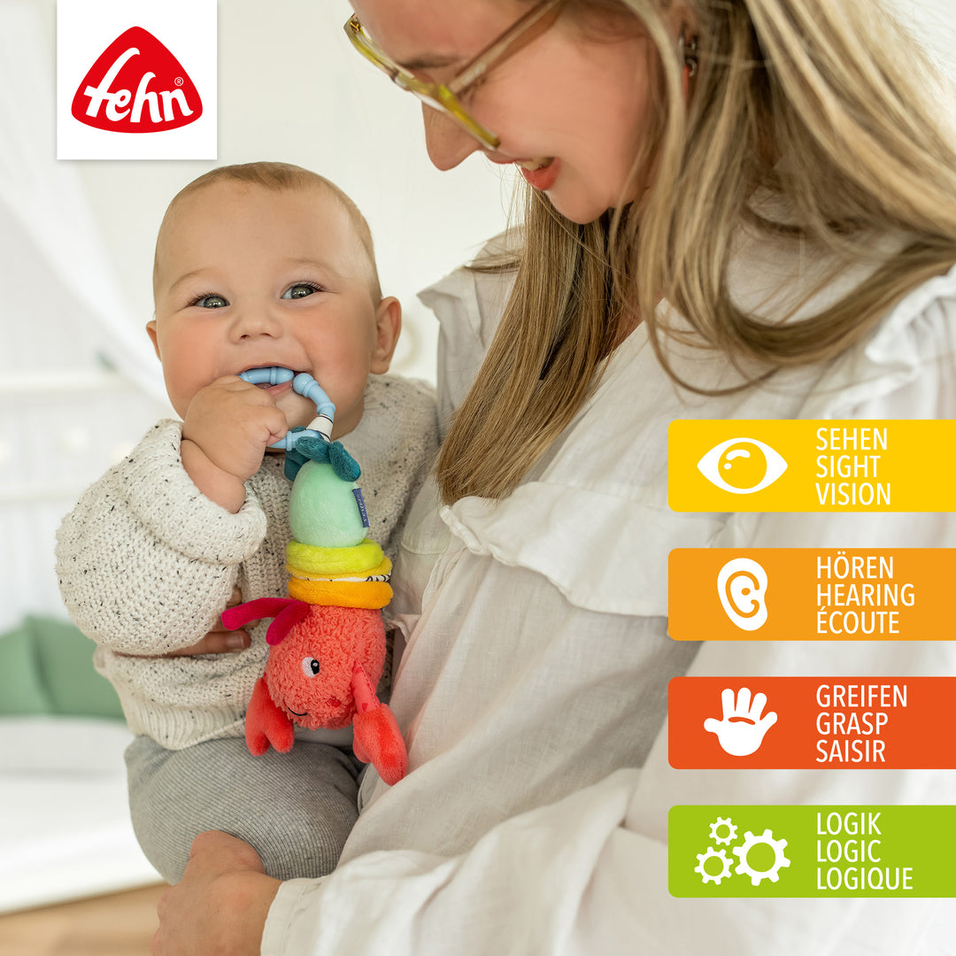 Baby spielt mit Baby Hummer mit Vibration  aus weichem Plüsch