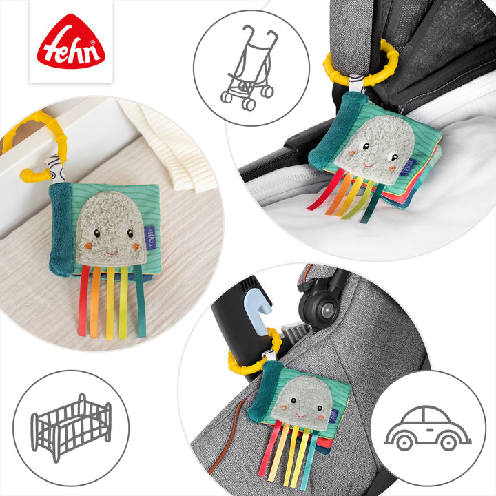 Mini-Knisterbuch Tintenfisch an Kinderwagen, Babyschale &amp; Babybett befestigt