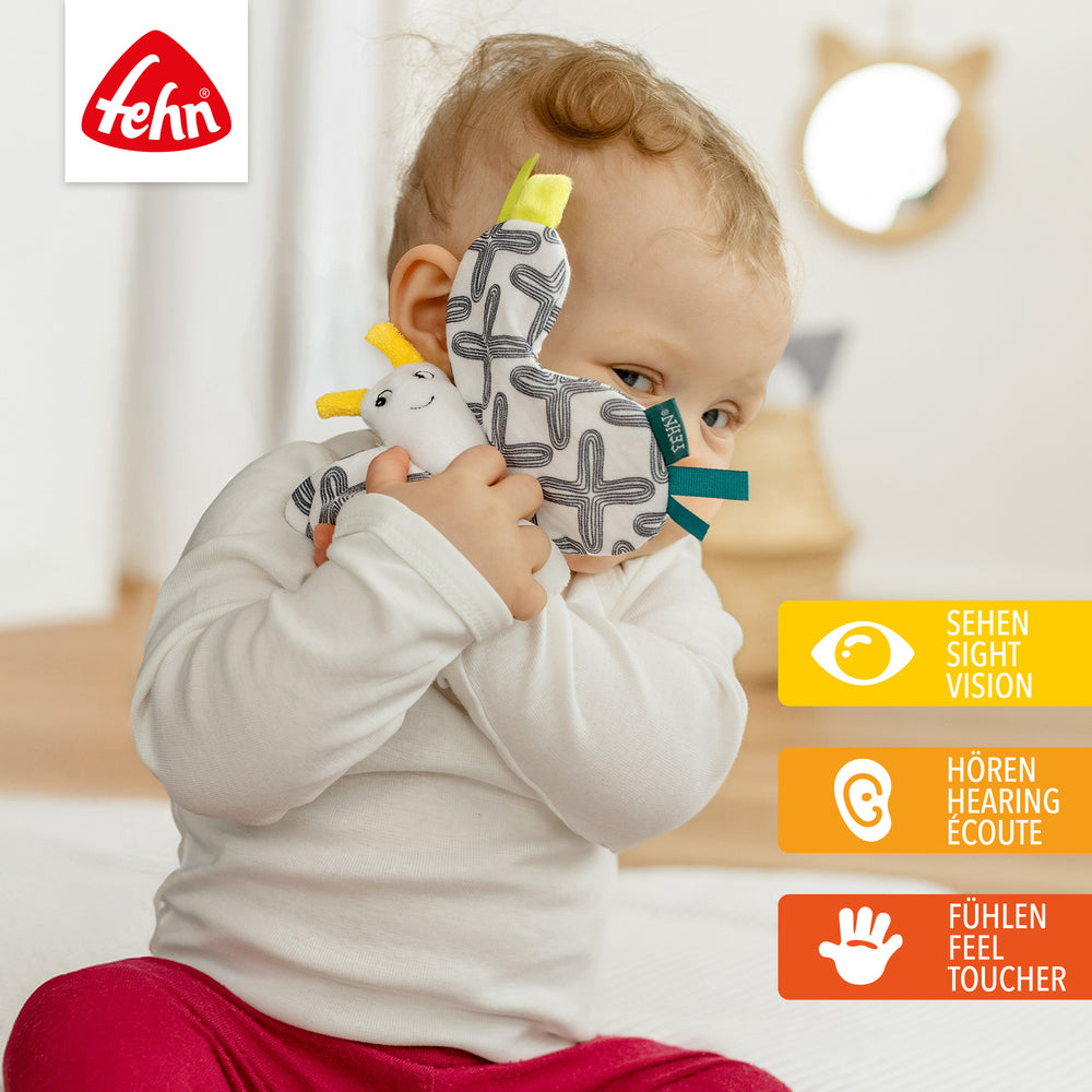 Baby entdeckt Baby Knister-Schmetterling aus weichem Musselin