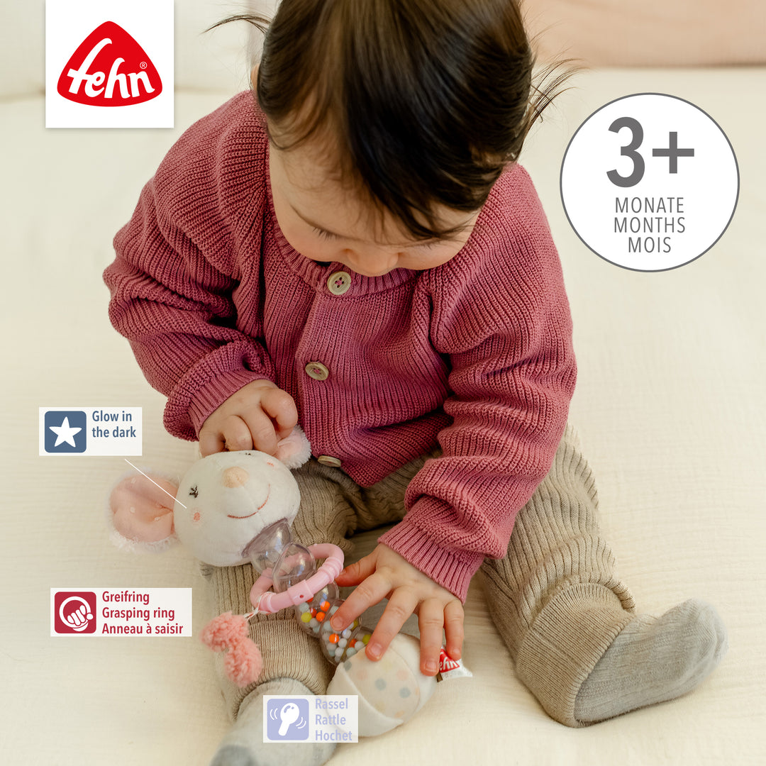 Baby spielt mit Baby Regenmacher Maus, mit Glow in the dark-Bestickung