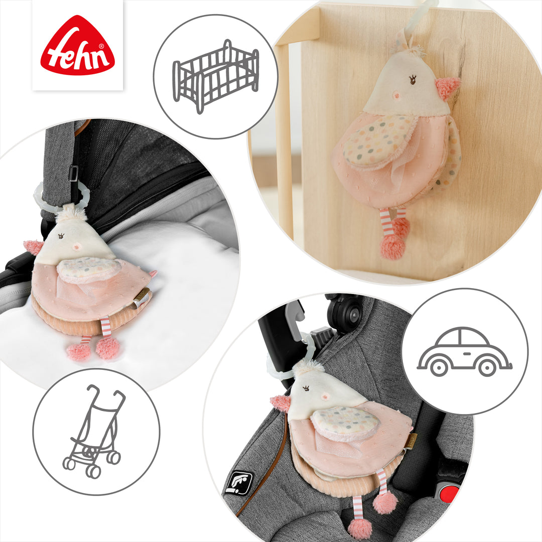 Baby Stoffbuch Vogel an Kinderwagen, Babyschale und Babybett befestigt