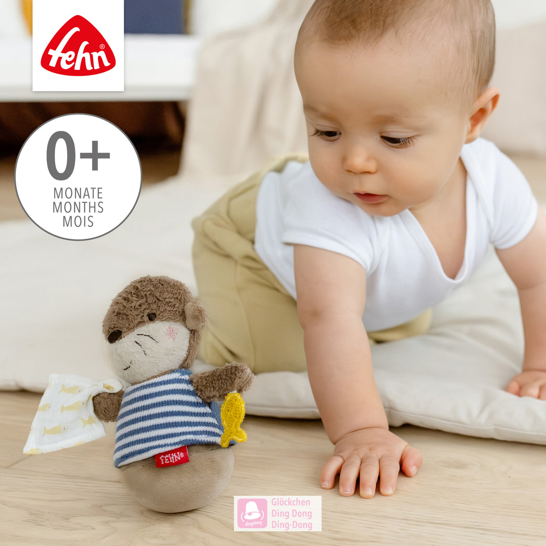 Baby beobachtet Baby Mini-Stehauf Otter