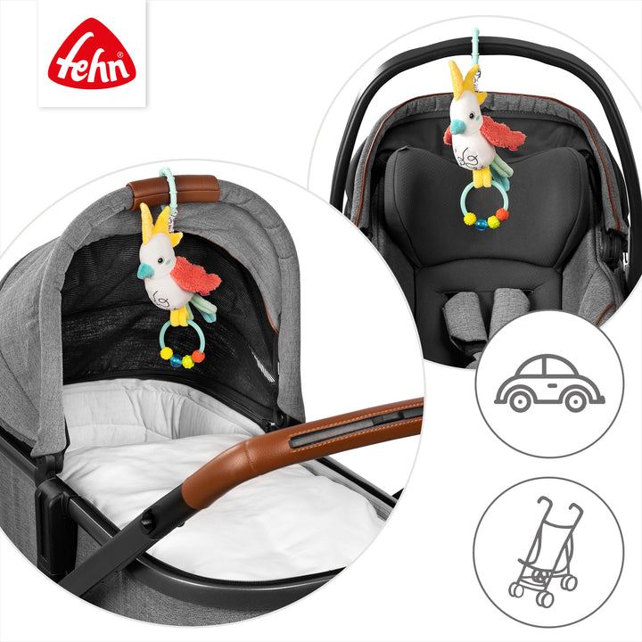 Baby Zwitscher-Vogel an Babyschale und Kinderwagen befestigt