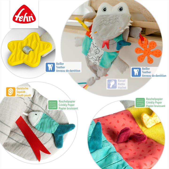 Detailansicht der Baby Handpuppe Krokodil mit Beißer, Rassel, Quietsche und Raschelpapier