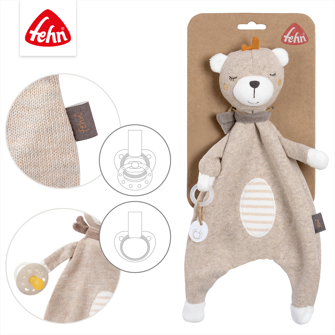 Details des Baby Schmusetuchs Teddy mit Schnullerring, auf Verpackung