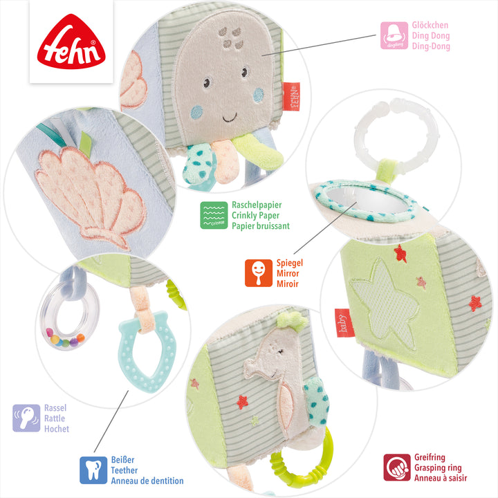 Detailansicht des Baby Activity-Würfels Meereskinder mit Glöckchen, Raschelpapier, Spiegel, Rassel, Beißer und Greifring