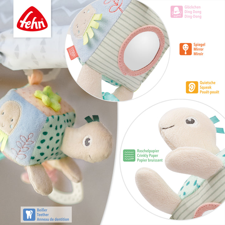 Detailansicht der Baby Activity-Schildkröte mit Glöckchen, Spiegel, Quietsche, Raschelpapier und Beißer