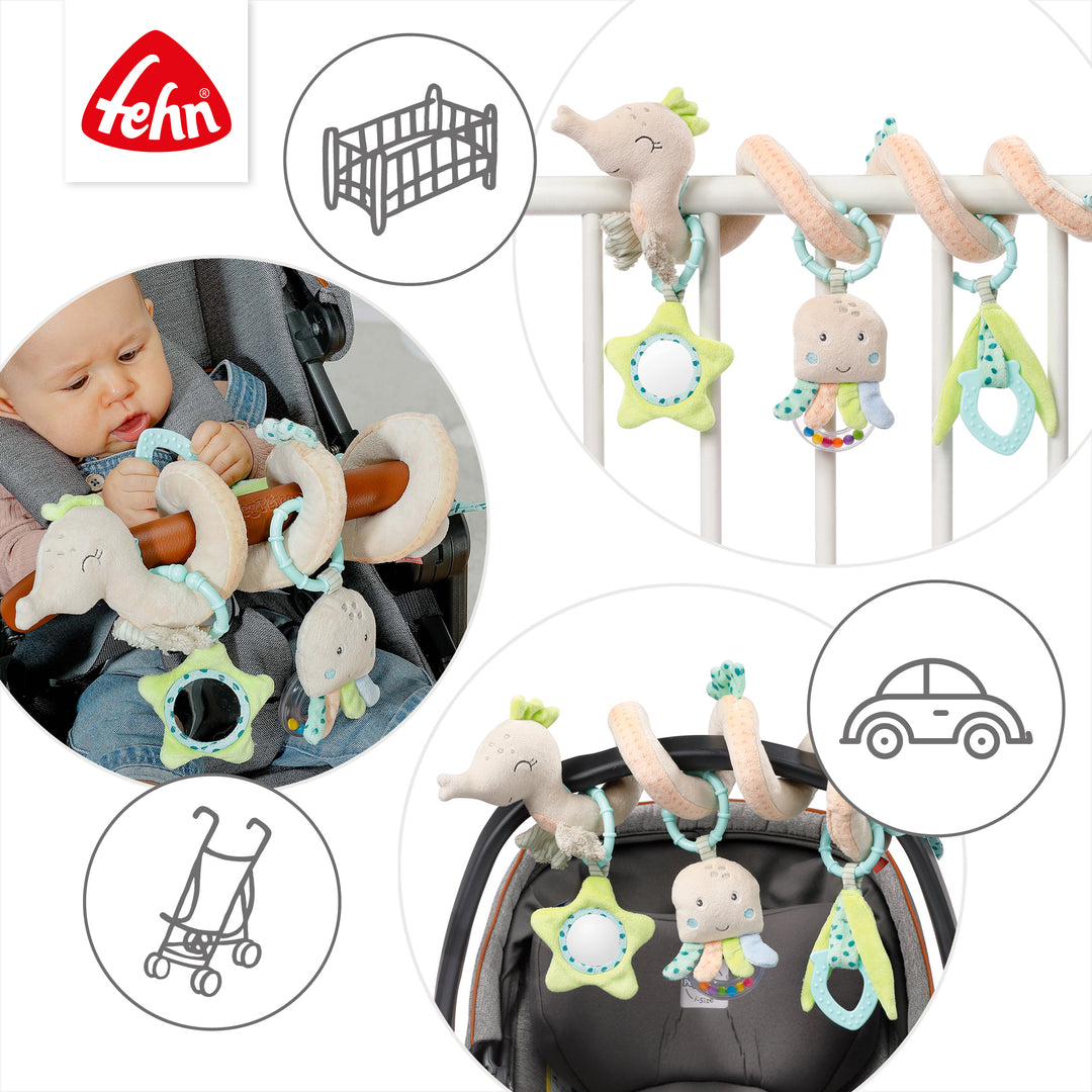 Baby Activity-Spirale Seepferd an Babybett, Babyschale und Kinderwagen befestigt