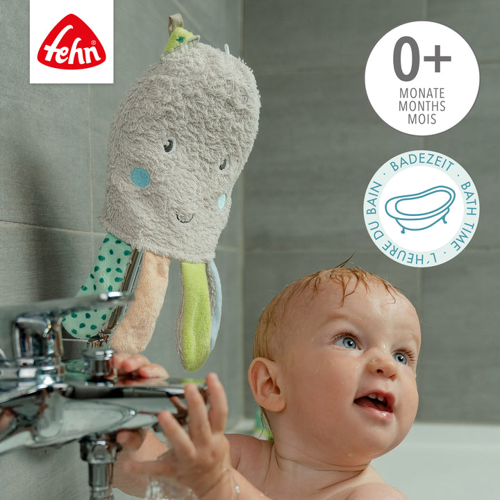 Baby mit Baby Waschhandschuh Oktopus für die Badezeit