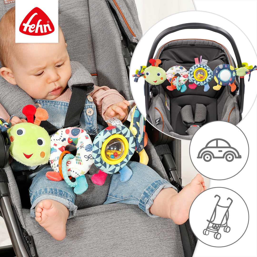 Baby Kinderwagenkette Raupe an Babyschale und Kinderwagen befestigt