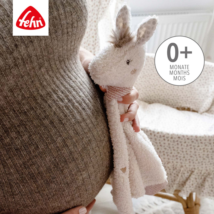 Mutter hält Baby Schmusetuch Lama Deluxe