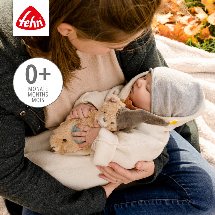 Baby schläft mit Baby Spieluhr Bär