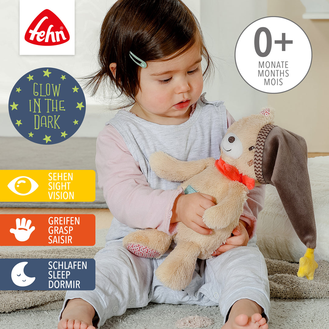 Baby spielt mit Baby Nachtlicht Bär