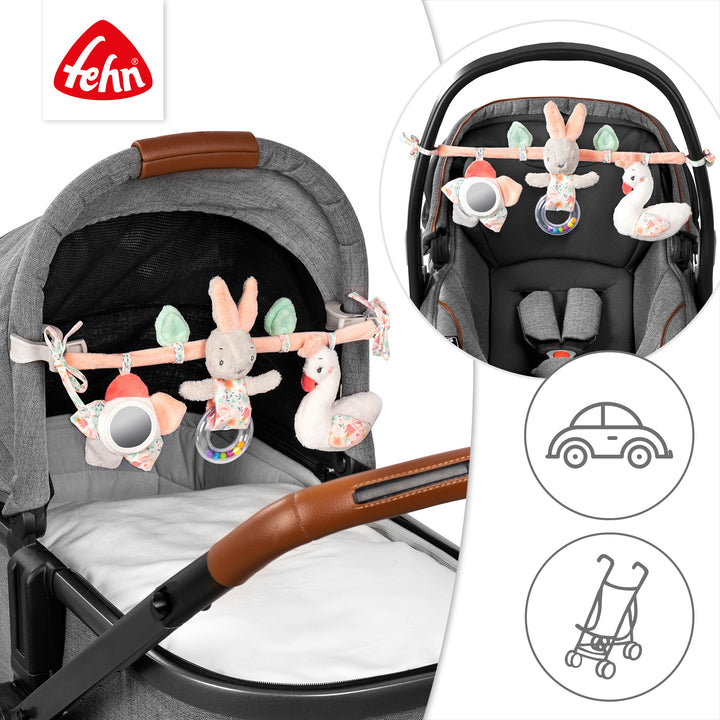 Baby Kinderwagenkette Schwanensee an Babyschale und Kinderwagen befestigt