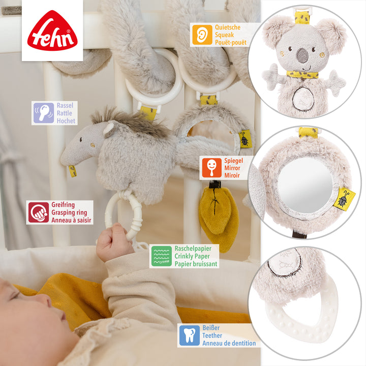 Detailansicht der Baby Activity-Spirale Australia mit Quietsche, Spiegel, Rassel, Greifring, Raschelpapier und Beißer