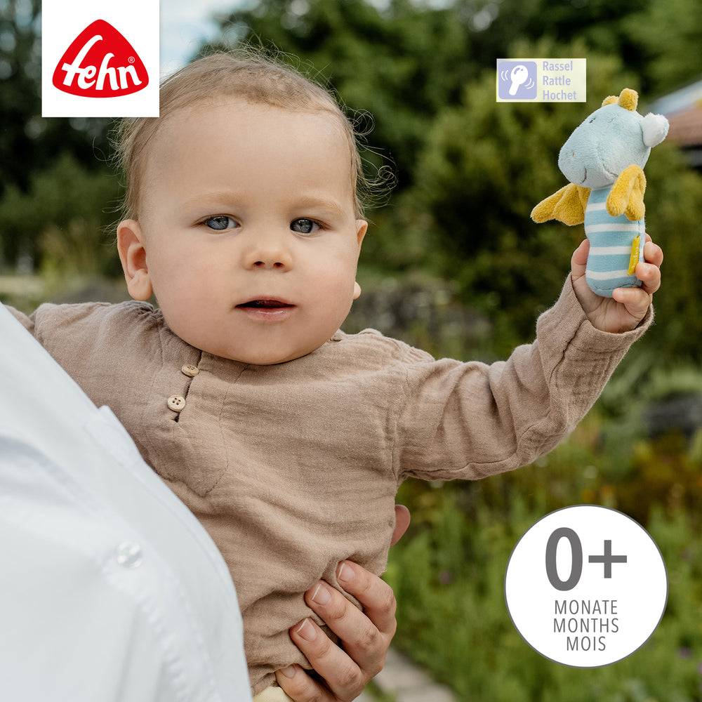 Baby hält Baby Mini-Rassel Drache
