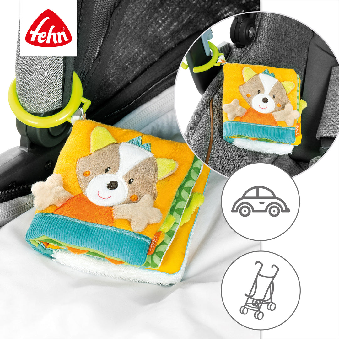 Baby Stoffbuch Fuchs an Kinderwagen und Babyschale befestigt