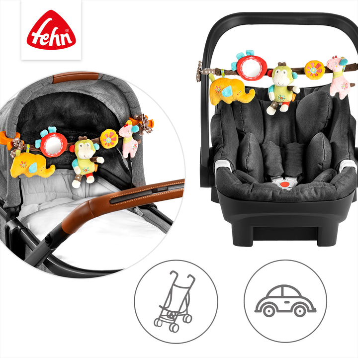 Baby Kinderwagenkette Safari an Babyschale und Kinderwagen befestigt