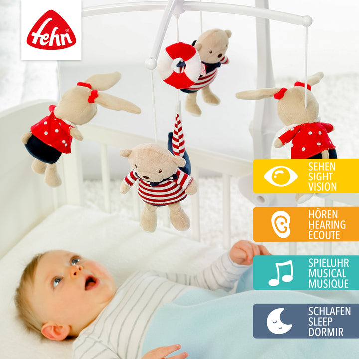 Baby liegt unter Baby Musik-Mobile Ocean Club