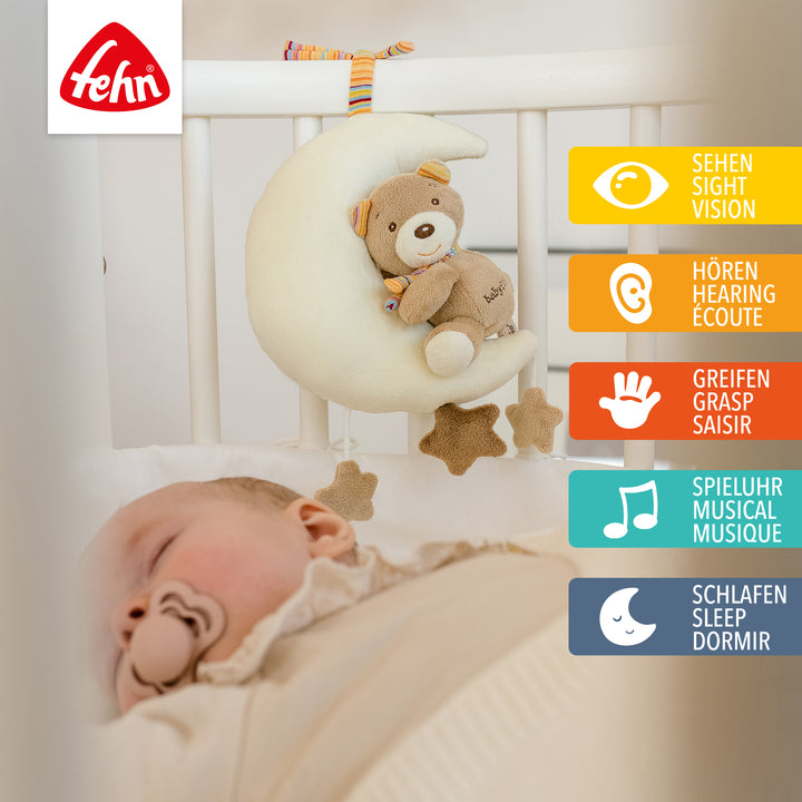 Baby Spieluhr Teddy im Mond am Babybett befestigt